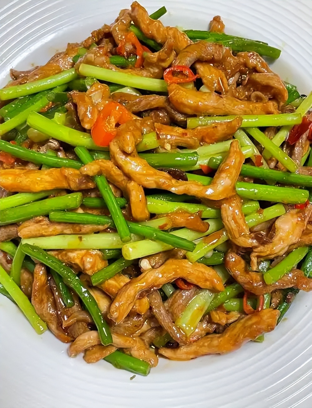 瘦肉炒不好别发愁!一招妙计,香嫩不柴无腥气,配菜随心超下饭(图2) 去腥炒瘦肉方法_炒瘦肉技巧_名菜家做猪肉