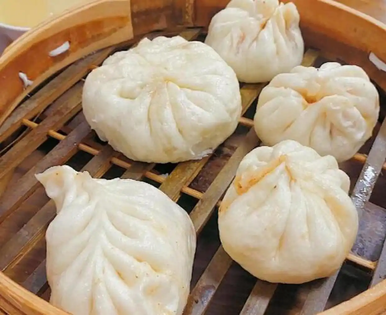 青岛十大特色小吃_青岛锅贴 海鲜水饺 青岛大包_青岛特色街边小吃