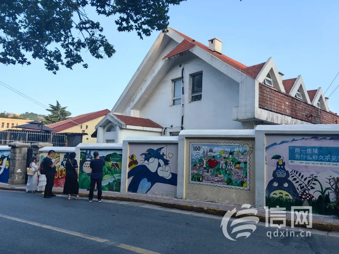 让艺术为城市增色 青岛涂鸦彩绘墙成游客“必打卡景点”(图2) 青岛涂鸦彩绘墙_青岛墙体彩绘Citywalk_室内墙面涂鸦
