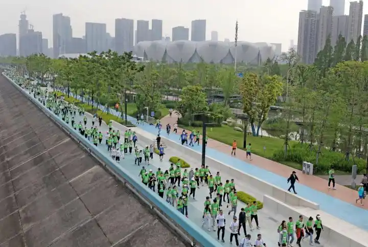 杭州国际毅行大会_杭州毅行旅游公司_钱塘江畔最美跑道
